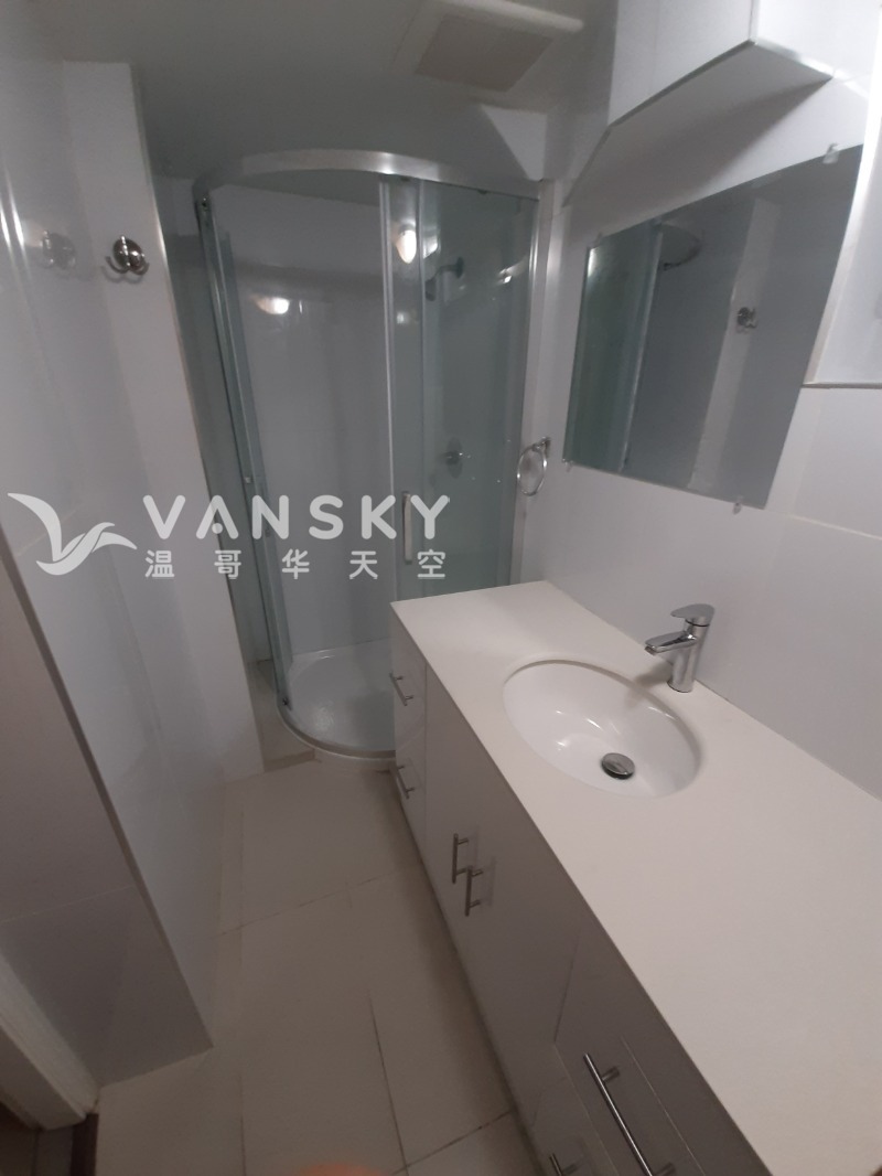 260110124405_ground bathrom shower and counter.jpg